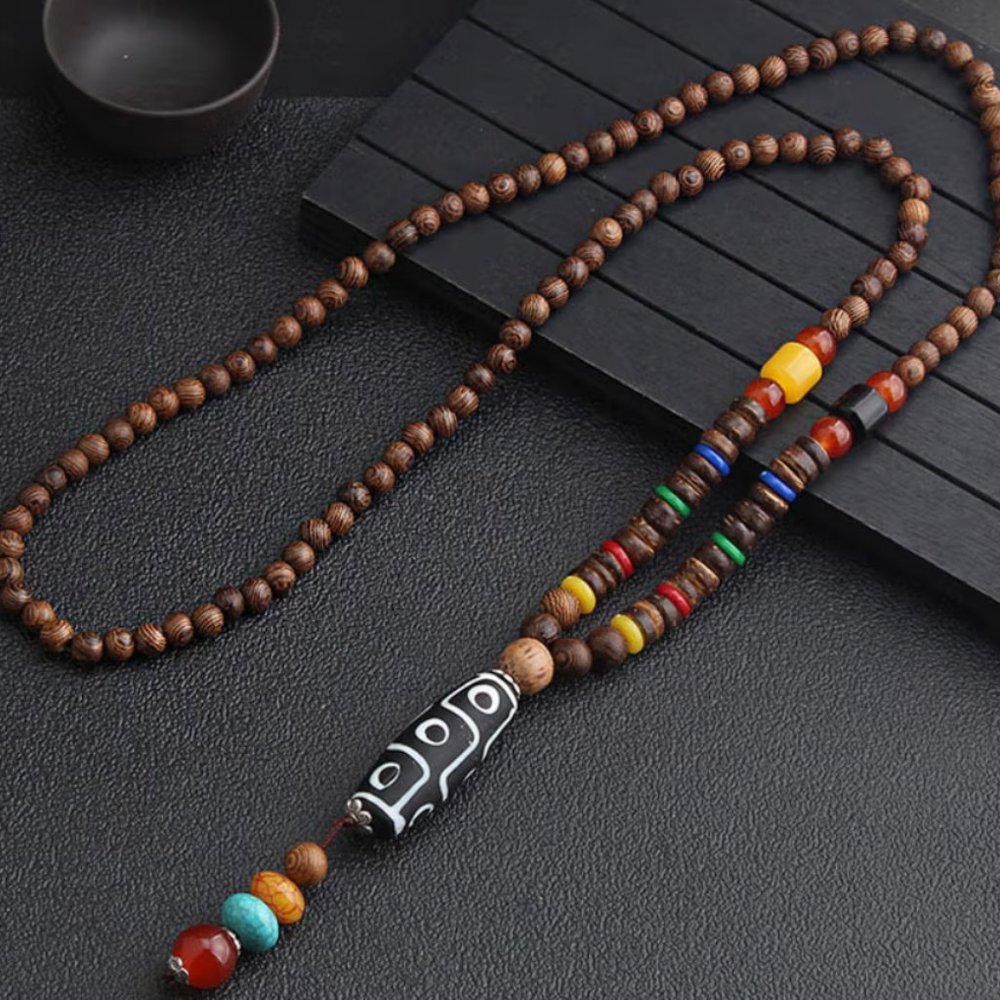 Wooden beaded necklace with Tibetan dzi pendant